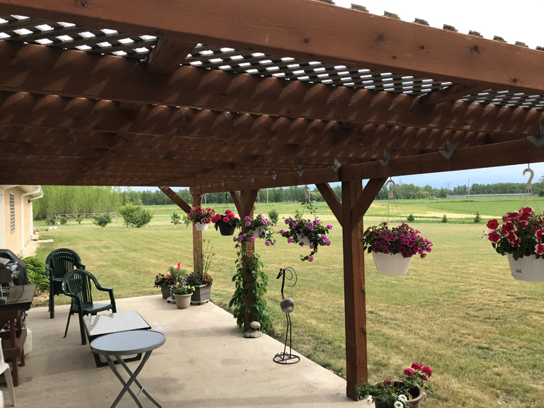Pergola seating with flowers